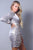 Metallic Long Sleeve V Neck Wrapped Asymmetric Hem Mini Dress